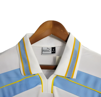 https://cdn.shopify.com/s/files/1/0826/7228/8075/files/19982000-lazio-cirio-puma-away-retro-kit-classickits433-300115.webp?v=1741199019