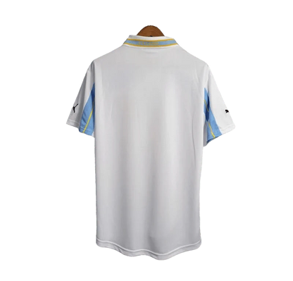 https://cdn.shopify.com/s/files/1/0826/7228/8075/files/19982000-lazio-cirio-puma-away-retro-kit-classickits433-814383.webp?v=1741199019