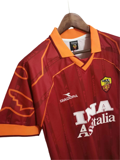 https://cdn.shopify.com/s/files/1/0826/7228/8075/files/19992000-as-roma-ina-assitalia-diadora-home-retro-kit-classickits433-814749.webp?v=1741199014