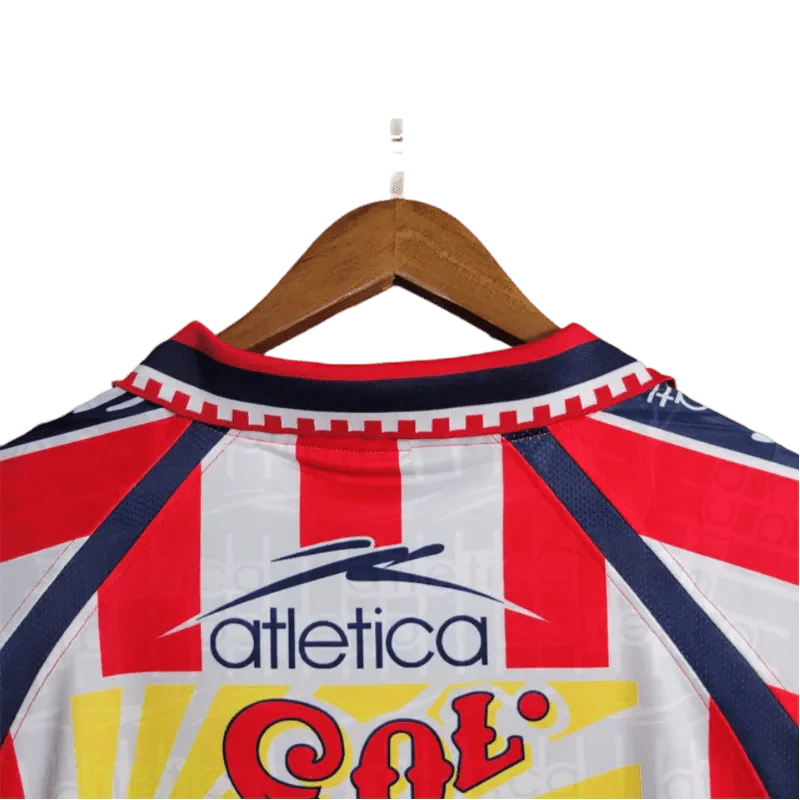https://cdn.shopify.com/s/files/1/0826/7228/8075/files/19992000-chivas-guadalajara-cemento-tolteca-home-retro-jersey-302507.webp?v=1741197178