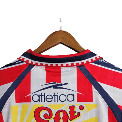 https://cdn.shopify.com/s/files/1/0826/7228/8075/files/19992000-chivas-guadalajara-cemento-tolteca-home-retro-jersey-302507.webp?v=1741197178