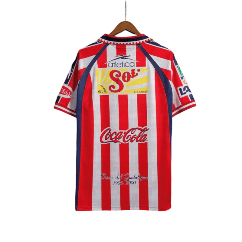https://cdn.shopify.com/s/files/1/0826/7228/8075/files/19992000-chivas-guadalajara-cemento-tolteca-home-retro-jersey-348408.webp?v=1741197177