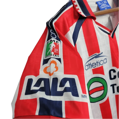 https://cdn.shopify.com/s/files/1/0826/7228/8075/files/19992000-chivas-guadalajara-cemento-tolteca-home-retro-jersey-559894.webp?v=1741197180