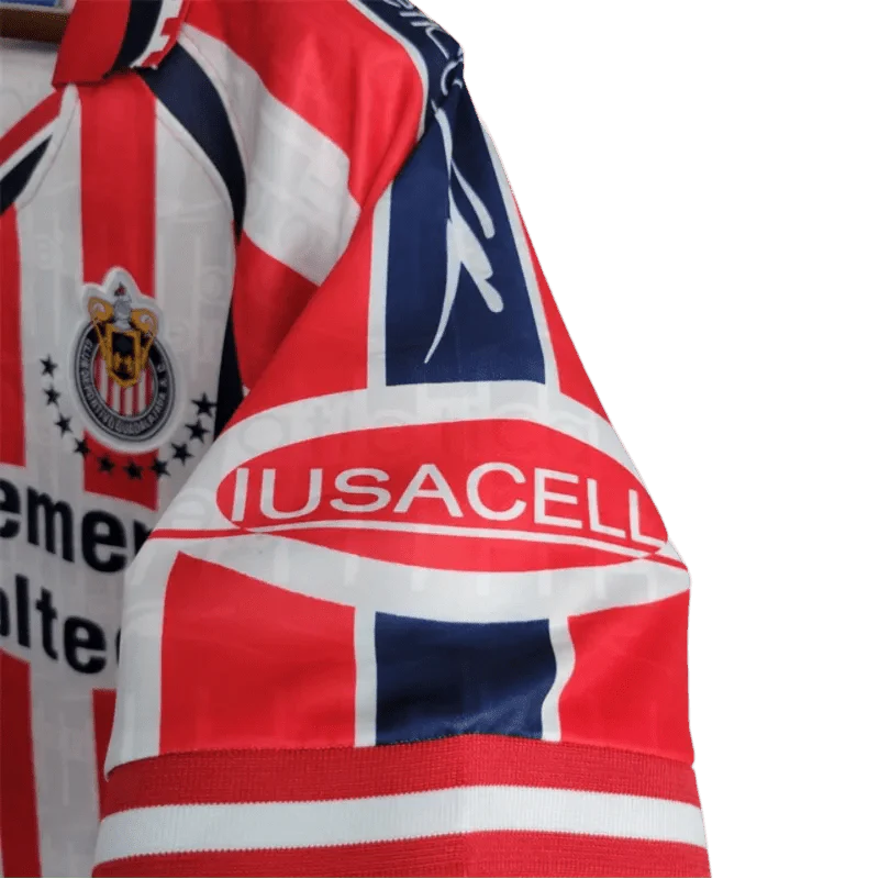 https://cdn.shopify.com/s/files/1/0826/7228/8075/files/19992000-chivas-guadalajara-cemento-tolteca-home-retro-jersey-973539.webp?v=1741197182