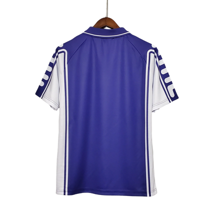 https://cdn.shopify.com/s/files/1/0826/7228/8075/files/19992000-fiorentina-florence-toyota-fila-home-retro-kit-classickits433-547770.webp?v=1741199030