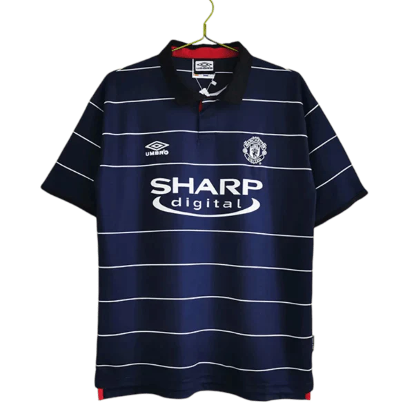 https://cdn.shopify.com/s/files/1/0826/7228/8075/files/19992000-manchester-united-sharp-digital-blue-away-retro-kit-classickits433-619465.webp?v=1741199145