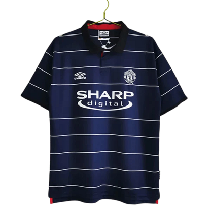 https://cdn.shopify.com/s/files/1/0826/7228/8075/files/19992000-manchester-united-sharp-digital-blue-away-retro-kit-classickits433-619465.webp?v=1741199145