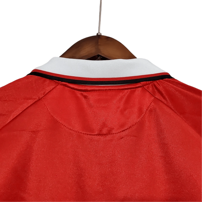 https://cdn.shopify.com/s/files/1/0826/7228/8075/files/19992000-manchester-united-sharp-international-retro-kit-long-sleeves-classickits433-641042.webp?v=1741197751