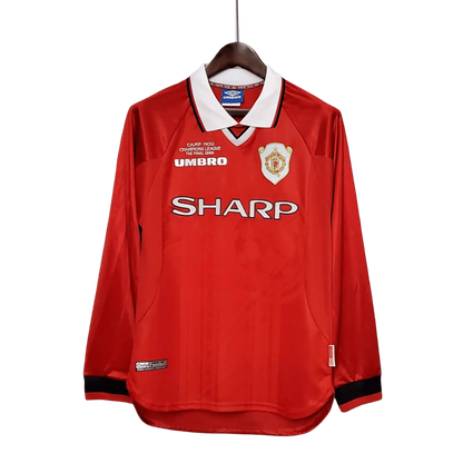 https://cdn.shopify.com/s/files/1/0826/7228/8075/files/19992000-manchester-united-sharp-international-retro-kit-long-sleeves-classickits433-848545.webp?v=1741197752