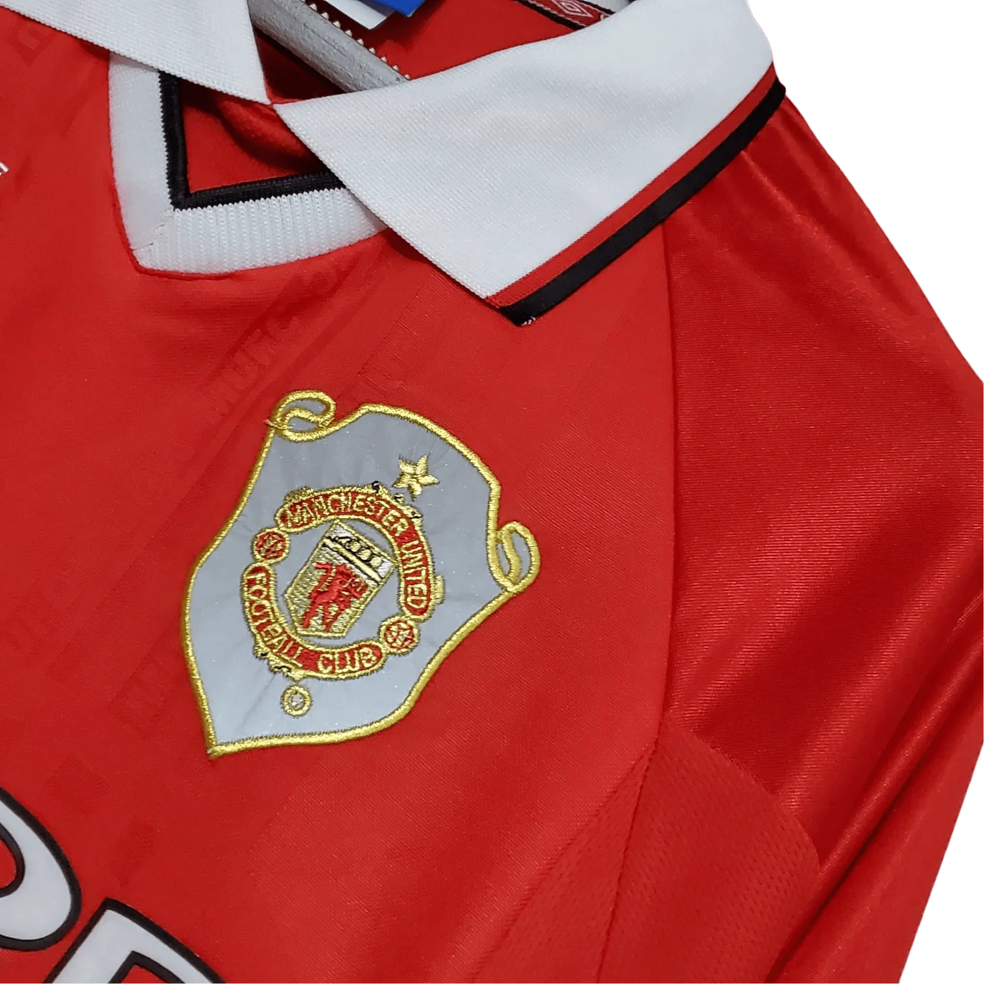 https://cdn.shopify.com/s/files/1/0826/7228/8075/files/19992000-manchester-united-sharp-international-retro-kit-long-sleeves-classickits433-893619.webp?v=1741197750