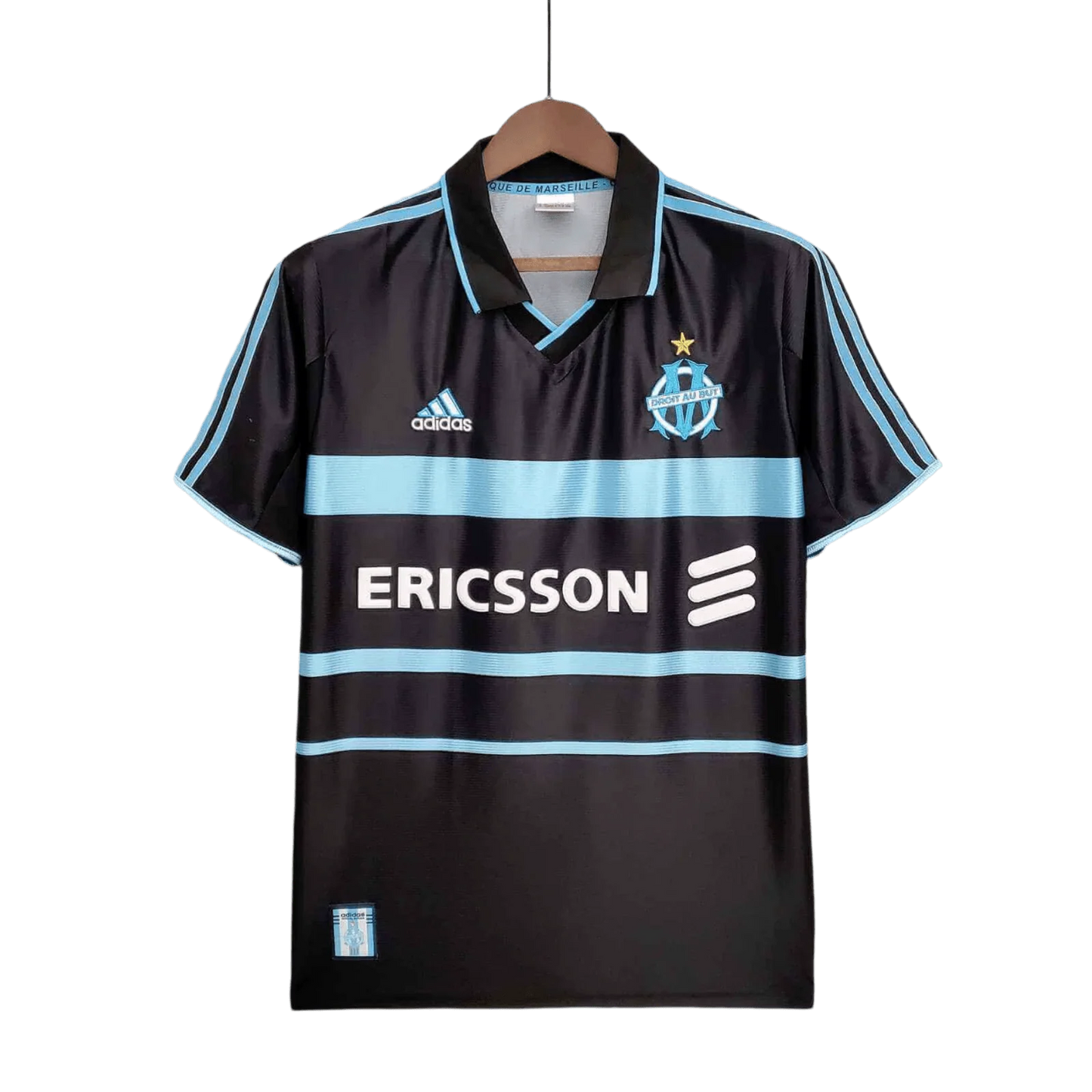 https://cdn.shopify.com/s/files/1/0826/7228/8075/files/19992000-olympique-de-marseille-ericsson-home-retro-kit-classickits433-900795.webp?v=1741199400
