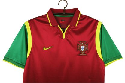 https://cdn.shopify.com/s/files/1/0826/7228/8075/files/19992000-portugal-home-retro-jersey-186947.webp?v=1741198524