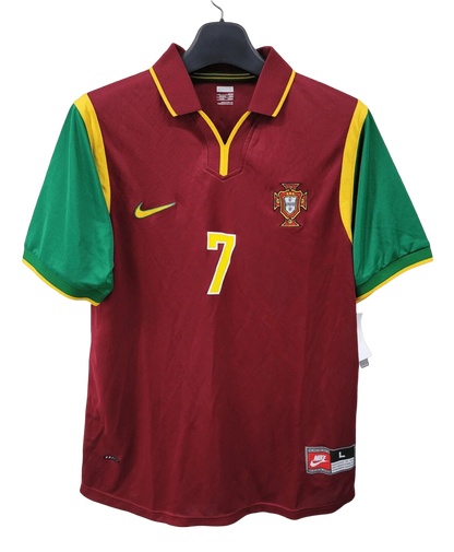 https://cdn.shopify.com/s/files/1/0826/7228/8075/files/19992000-portugal-home-retro-jersey-598071.webp?v=1741198524