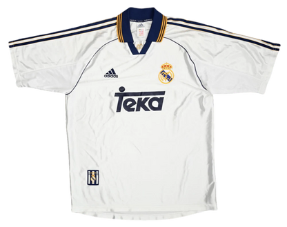 https://cdn.shopify.com/s/files/1/0826/7228/8075/files/19992000-real-madrid-teka-white-home-retro-kit-classickits433-354639.webp?v=1741199042