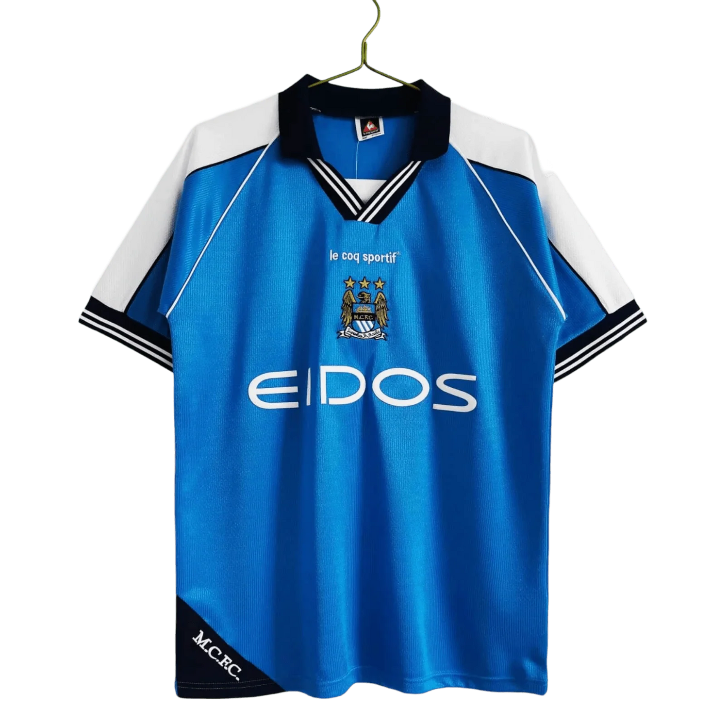 https://cdn.shopify.com/s/files/1/0826/7228/8075/files/19992001-manchester-city-eidos-home-retro-kit-classickits433-139362.webp?v=1741199200