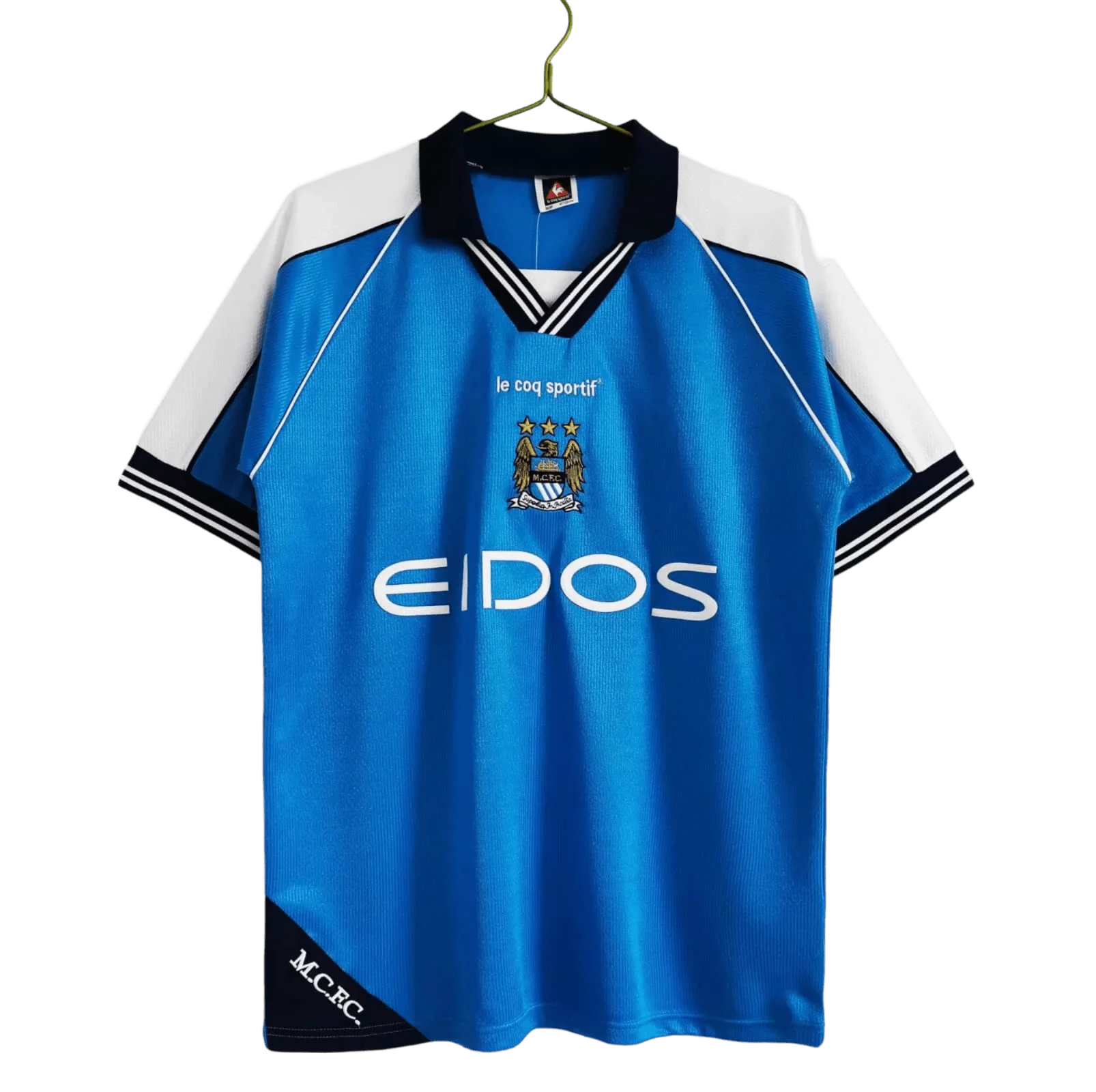 https://cdn.shopify.com/s/files/1/0826/7228/8075/files/19992001-manchester-city-eidos-home-retro-kit-classickits433-139362.webp?v=1741199200