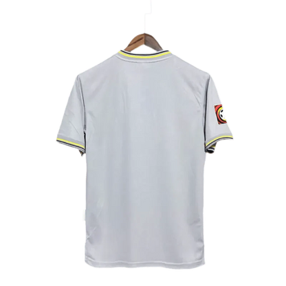 https://cdn.shopify.com/s/files/1/0826/7228/8075/files/2000-borussia-dortmund-eon-away-retro-kit-classickits433-976256.webp?v=1741197746