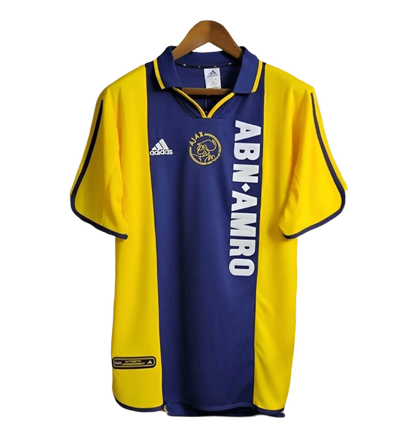 https://cdn.shopify.com/s/files/1/0826/7228/8075/files/20002001-ajax-abn-amro-away-retro-kit-classickits433-301547.webp?v=1741199338
