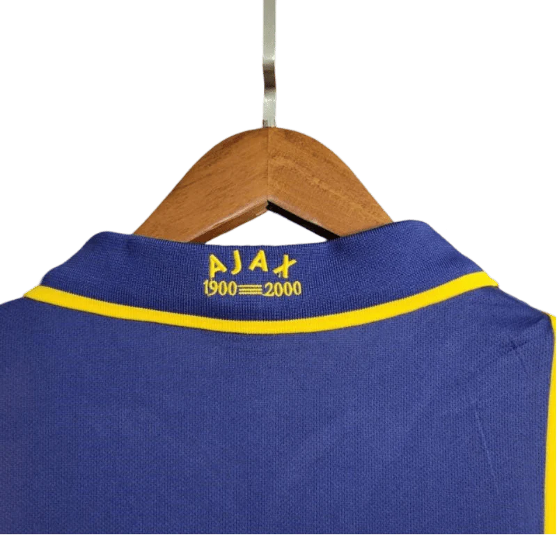 https://cdn.shopify.com/s/files/1/0826/7228/8075/files/20002001-ajax-abn-amro-away-retro-kit-classickits433-317842.webp?v=1741199337