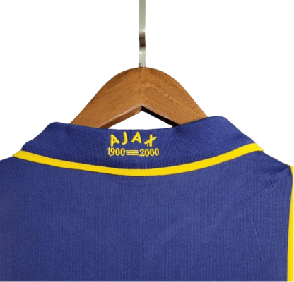 https://cdn.shopify.com/s/files/1/0826/7228/8075/files/20002001-ajax-abn-amro-away-retro-kit-classickits433-317842.webp?v=1741199337