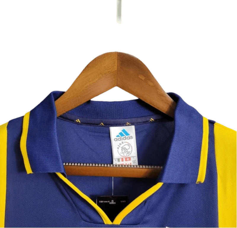 https://cdn.shopify.com/s/files/1/0826/7228/8075/files/20002001-ajax-abn-amro-away-retro-kit-classickits433-964542.webp?v=1741199338