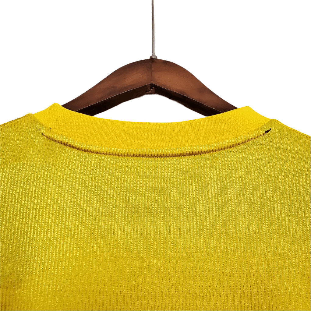 https://cdn.shopify.com/s/files/1/0826/7228/8075/files/20002001-arsenal-sega-yellow-away-retro-kit-classickits433-972706.webp?v=1741199340