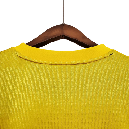 https://cdn.shopify.com/s/files/1/0826/7228/8075/files/20002001-arsenal-sega-yellow-away-retro-kit-classickits433-972706.webp?v=1741199340