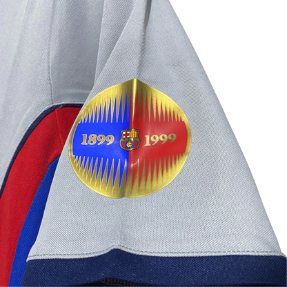 https://cdn.shopify.com/s/files/1/0826/7228/8075/files/20002001-fc-barcelona-away-retro-kit-classickits433-269633.webp?v=1741197544