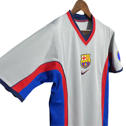 https://cdn.shopify.com/s/files/1/0826/7228/8075/files/20002001-fc-barcelona-away-retro-kit-classickits433-461498.webp?v=1741197543