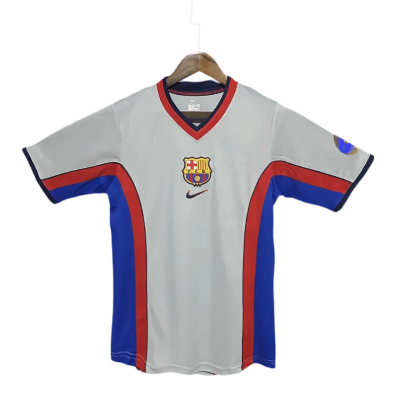 https://cdn.shopify.com/s/files/1/0826/7228/8075/files/20002001-fc-barcelona-away-retro-kit-classickits433-583332.webp?v=1741197542