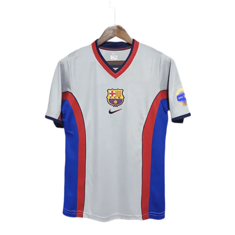 https://cdn.shopify.com/s/files/1/0826/7228/8075/files/20002001-fc-barcelona-away-retro-kit-classickits433-587928.webp?v=1741197543