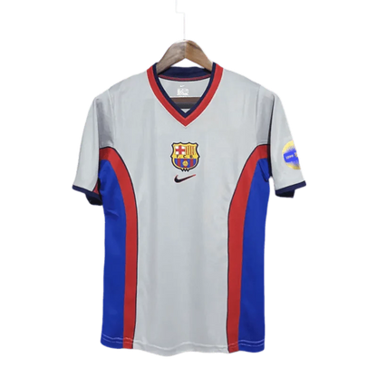 https://cdn.shopify.com/s/files/1/0826/7228/8075/files/20002001-fc-barcelona-away-retro-kit-classickits433-587928.webp?v=1741197543