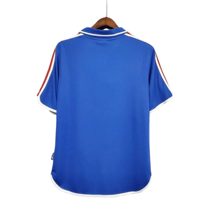 https://cdn.shopify.com/s/files/1/0826/7228/8075/files/20002001-france-home-retro-jersey-262261.webp?v=1741198520