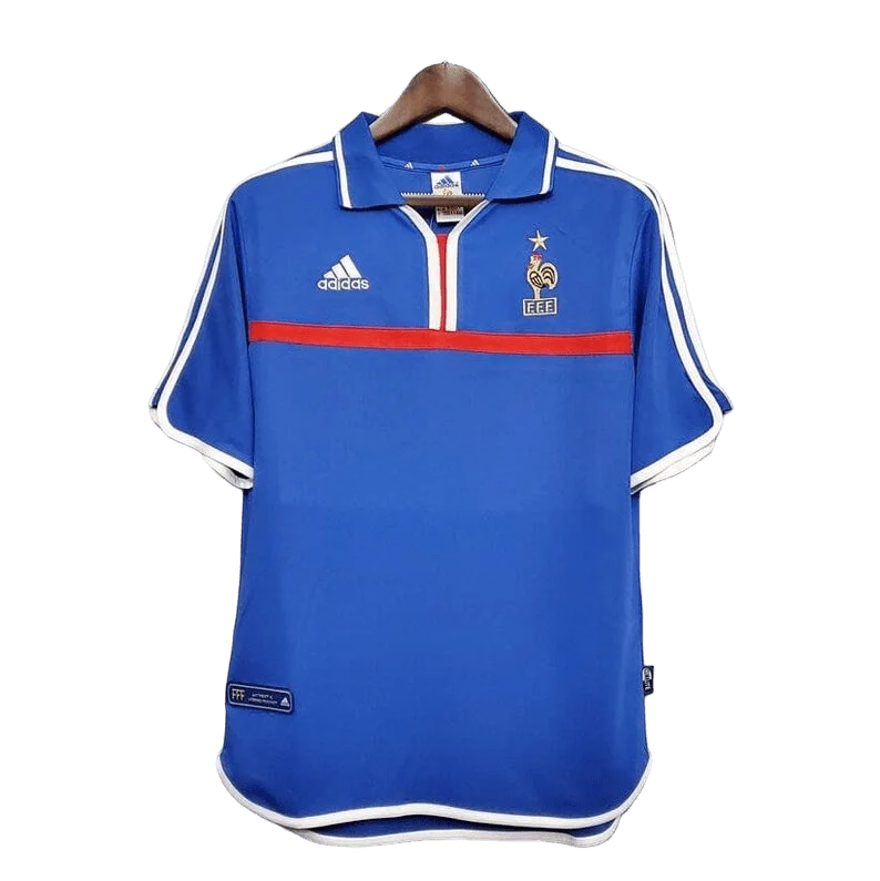 https://cdn.shopify.com/s/files/1/0826/7228/8075/files/20002001-france-home-retro-jersey-473401.webp?v=1741198520