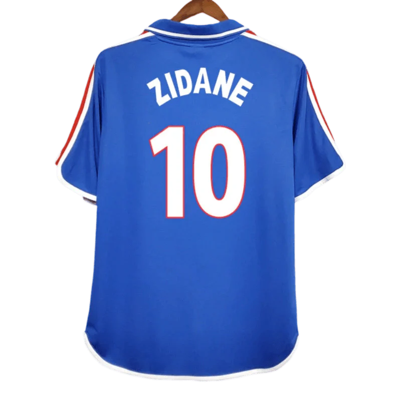 https://cdn.shopify.com/s/files/1/0826/7228/8075/files/20002001-france-home-retro-jersey-631957.webp?v=1741198518