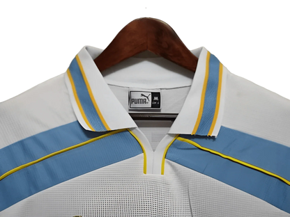 https://cdn.shopify.com/s/files/1/0826/7228/8075/files/20002001-lazio-siemens-away-retro-kit-classickits433-477706.webp?v=1741199044