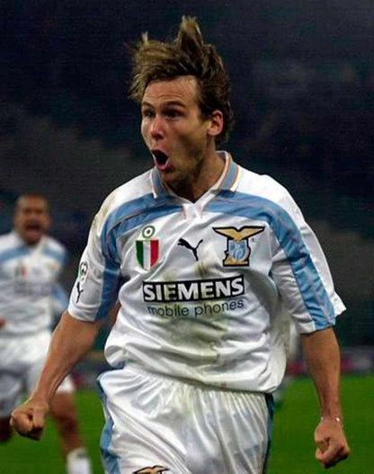 https://cdn.shopify.com/s/files/1/0826/7228/8075/files/20002001-lazio-siemens-away-retro-kit-classickits433-770170.webp?v=1741199045