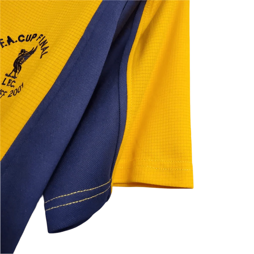 https://cdn.shopify.com/s/files/1/0826/7228/8075/files/20002001-liverpool-carlsberg-yellow-away-retro-kit-classickits433-197434.webp?v=1741199192