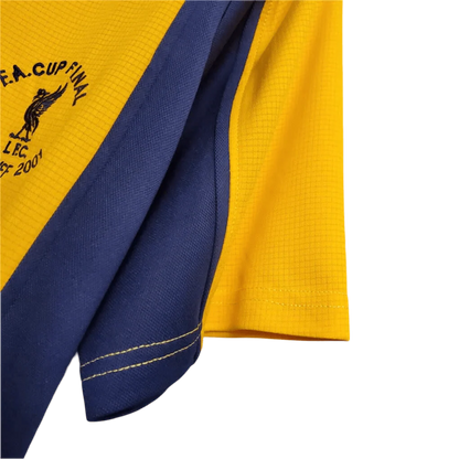 https://cdn.shopify.com/s/files/1/0826/7228/8075/files/20002001-liverpool-carlsberg-yellow-away-retro-kit-classickits433-197434.webp?v=1741199192