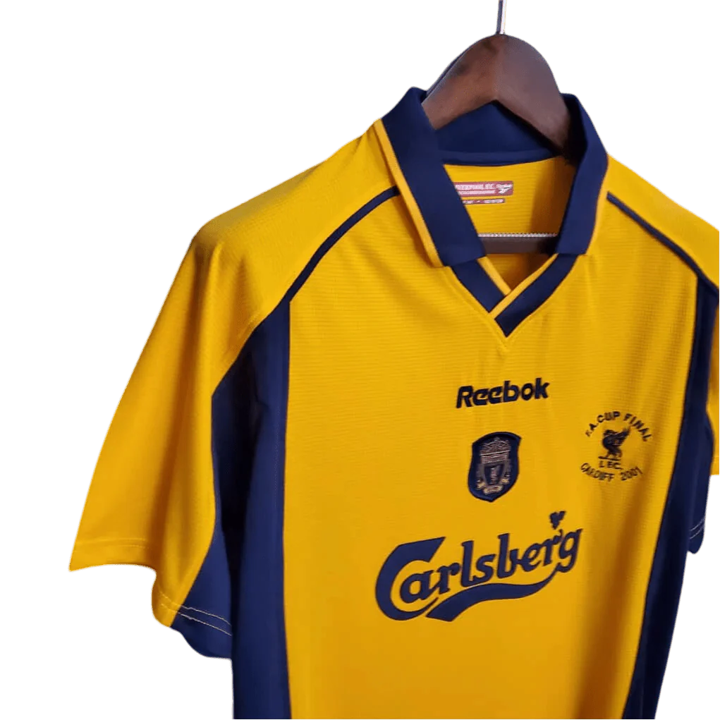 https://cdn.shopify.com/s/files/1/0826/7228/8075/files/20002001-liverpool-carlsberg-yellow-away-retro-kit-classickits433-284287.webp?v=1741199192