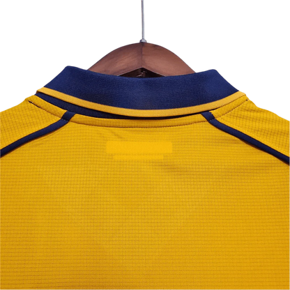 https://cdn.shopify.com/s/files/1/0826/7228/8075/files/20002001-liverpool-carlsberg-yellow-away-retro-kit-classickits433-494569.webp?v=1741199191