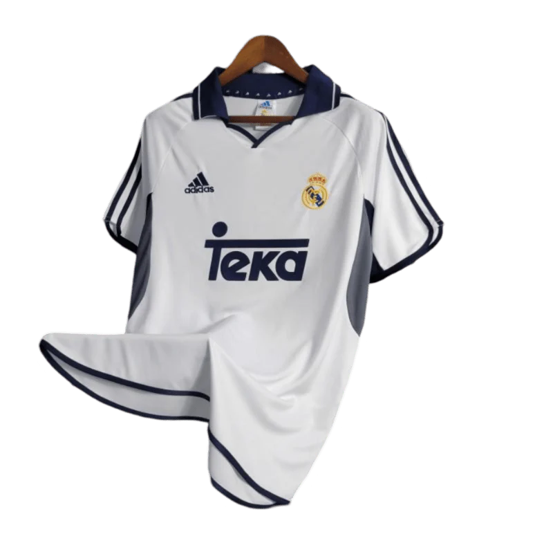 https://cdn.shopify.com/s/files/1/0826/7228/8075/files/20002001-real-madrid-teka-white-home-retro-kit-classickits433-869720.webp?v=1741199026