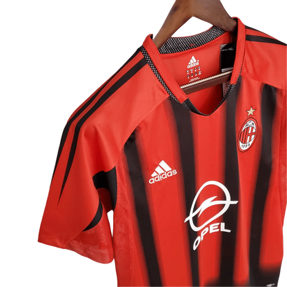 https://cdn.shopify.com/s/files/1/0826/7228/8075/files/20002002-ac-milan-opel-home-retro-kit-552209.webp?v=1741197453