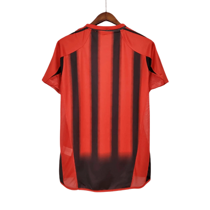 https://cdn.shopify.com/s/files/1/0826/7228/8075/files/20002002-ac-milan-opel-home-retro-kit-799538.webp?v=1741197451