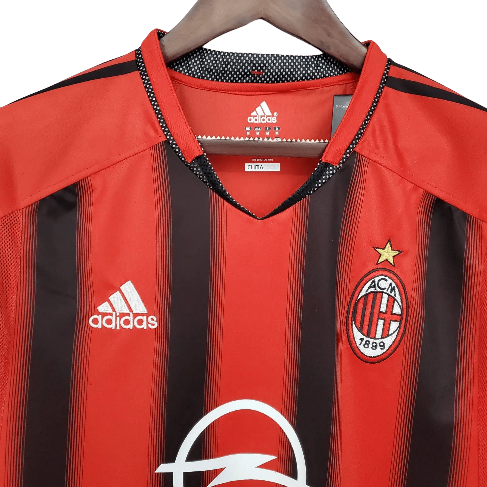 https://cdn.shopify.com/s/files/1/0826/7228/8075/files/20002002-ac-milan-opel-home-retro-kit-983554.webp?v=1741197452