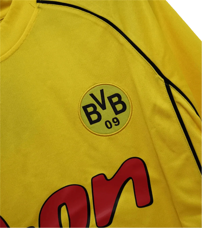 https://cdn.shopify.com/s/files/1/0826/7228/8075/files/20012002-borussia-dortmund-eon-champions-league-retro-kit-classickits433-633540.webp?v=1741197744