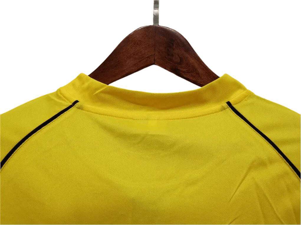 https://cdn.shopify.com/s/files/1/0826/7228/8075/files/20012002-borussia-dortmund-eon-champions-league-retro-kit-classickits433-924264.webp?v=1741197744