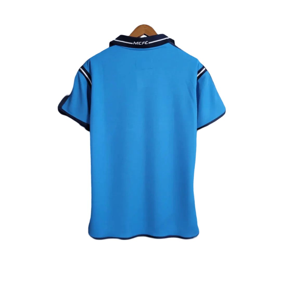https://cdn.shopify.com/s/files/1/0826/7228/8075/files/20012002-manchester-city-eidos-home-retro-kit-classickits433-329877.webp?v=1741198006