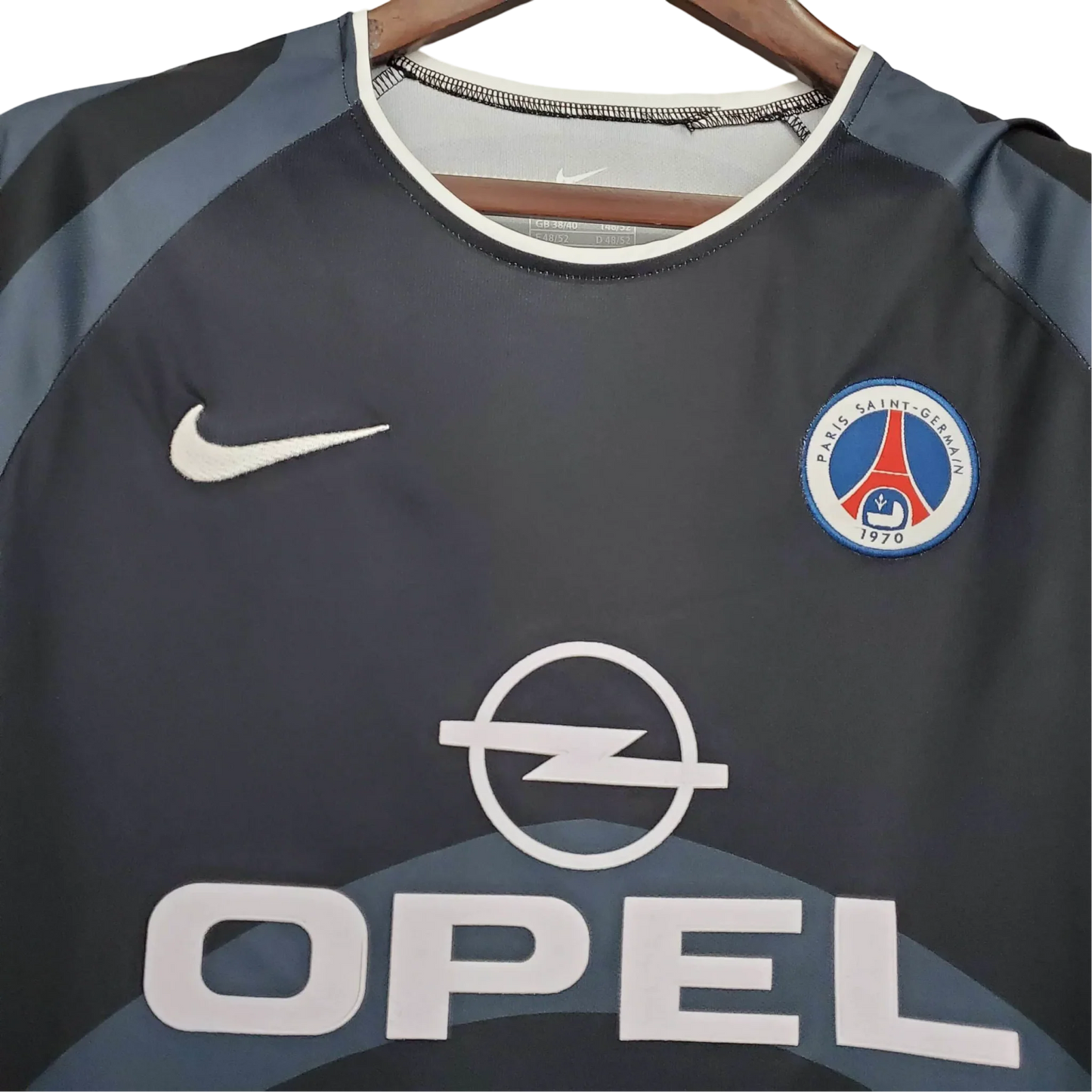 https://cdn.shopify.com/s/files/1/0826/7228/8075/files/20012002-paris-saint-germain-opel-3rd-black-retro-kit-917682.webp?v=1741198008