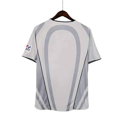 https://cdn.shopify.com/s/files/1/0826/7228/8075/files/20012002-paris-saint-germain-opel-away-grey-retro-jersey-258104.webp?v=1741198007
